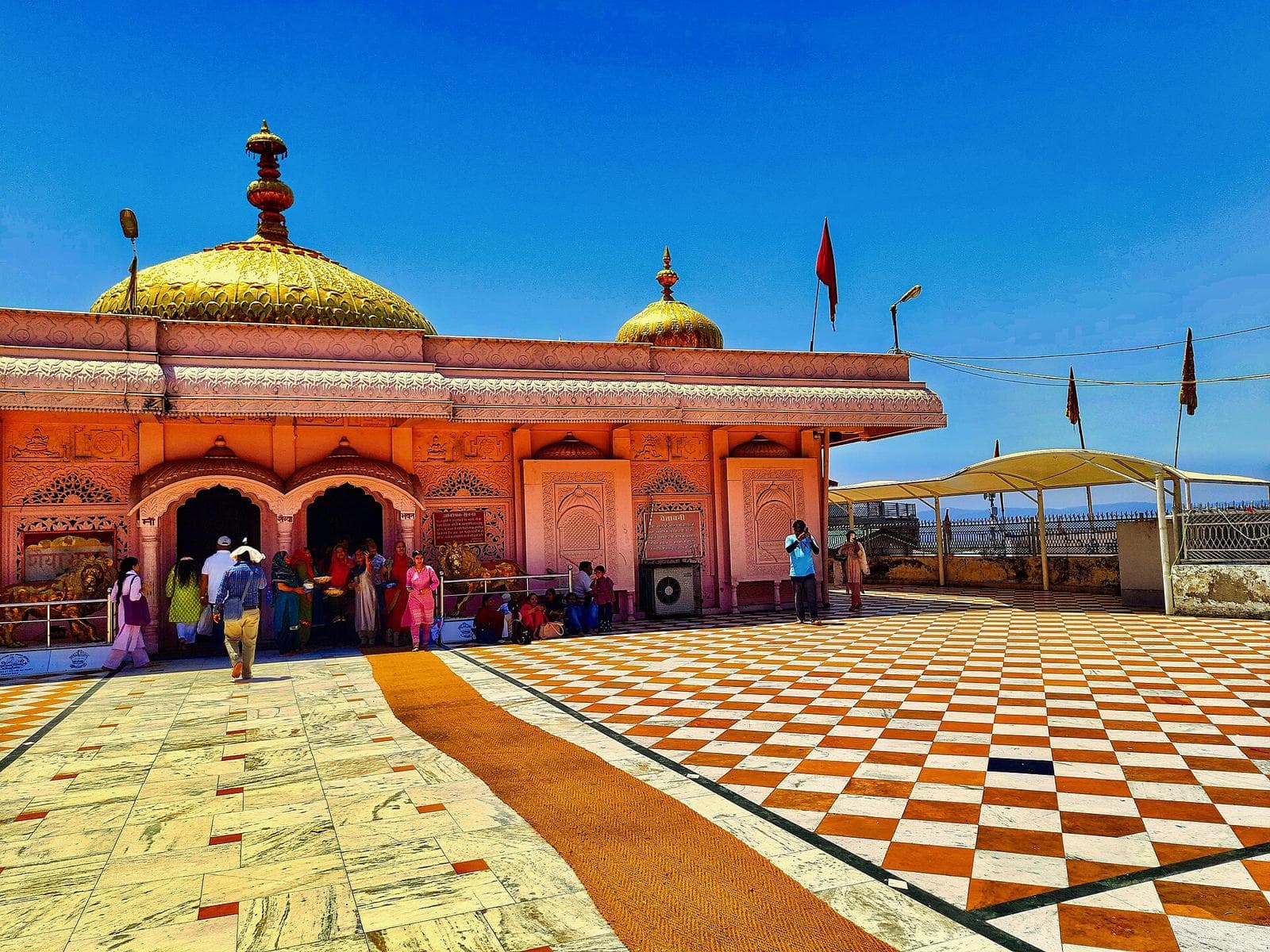 Golden dome and marble courtyard of the Jwalamukhi (Jwala Ji) temple