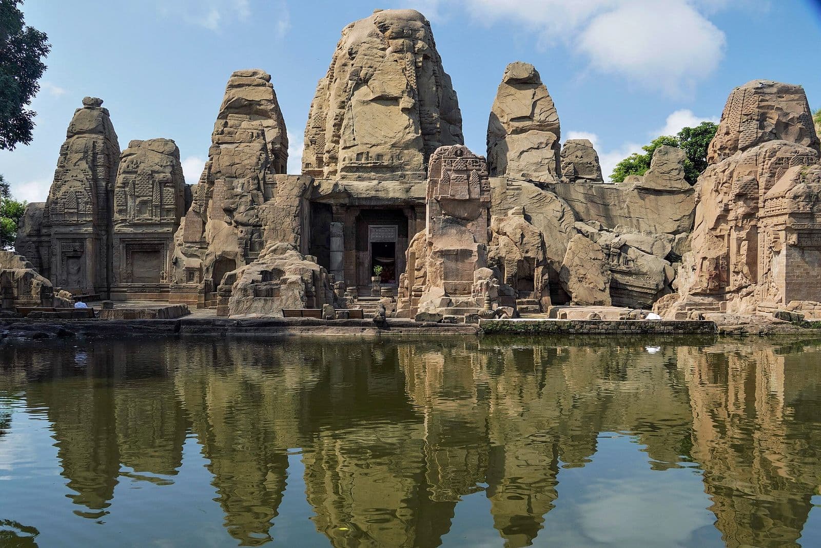 Masroor rock-cut temples reflected in the sacred water tank, Kangra