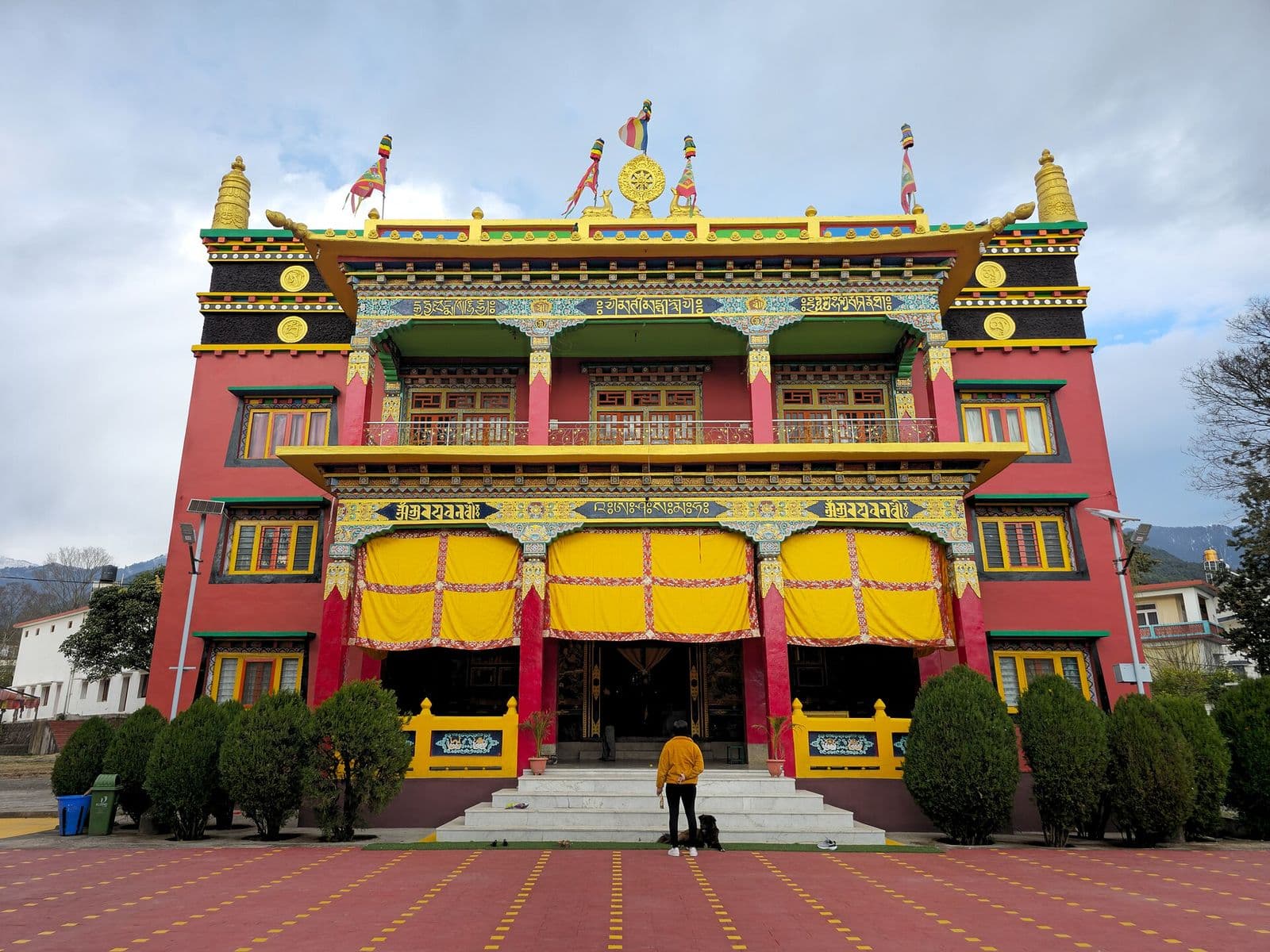 Colourful facade of Chokling Monastery in the Tibetan colony at Bir