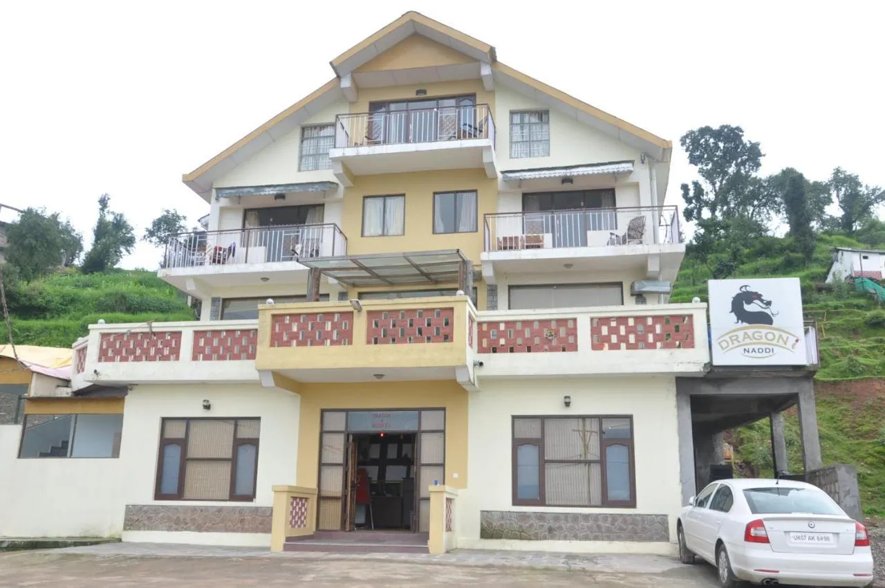 Dragon I Resorts building with Dragon I Naddi signboard and balconies