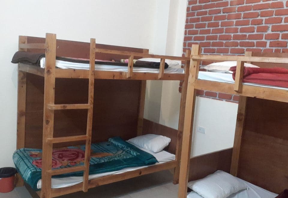 Bunk-bed dormitory room at White Water Inn