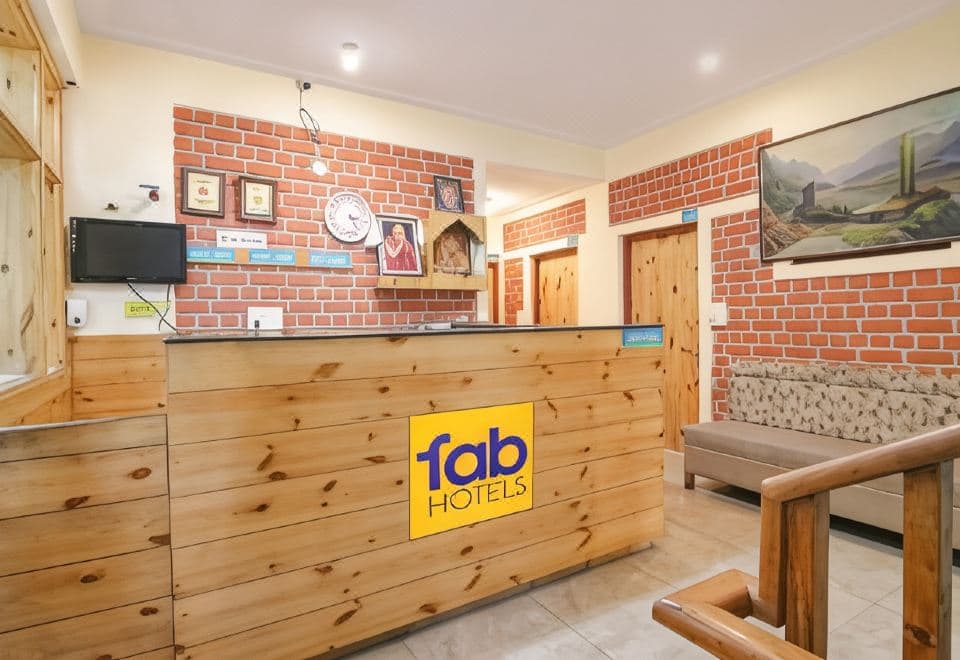 Reception with wood and brick walls at White Water Inn