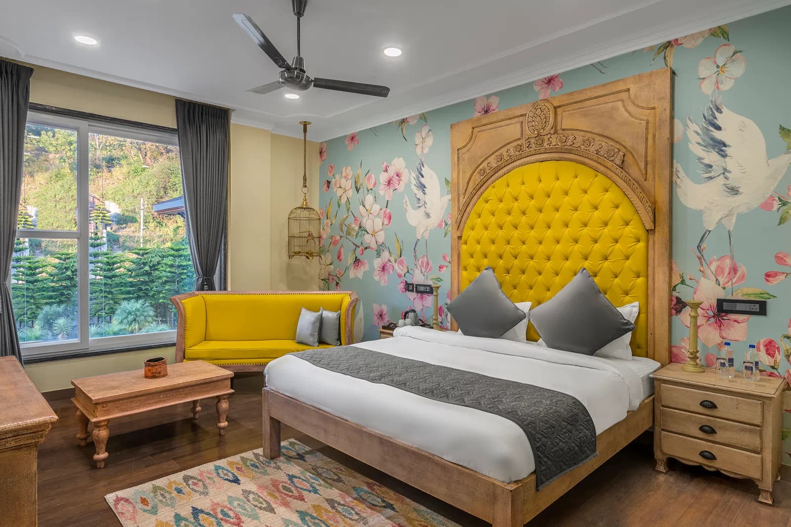 Deluxe Room with carved headboard at Atman, Dharamshala