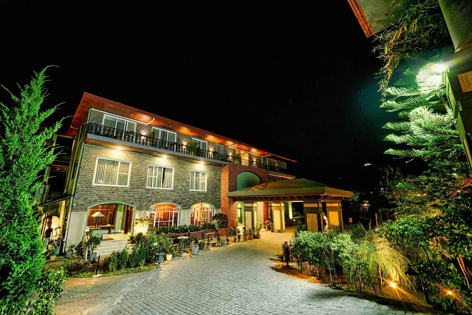 Atman, Dharamshala lit up at night