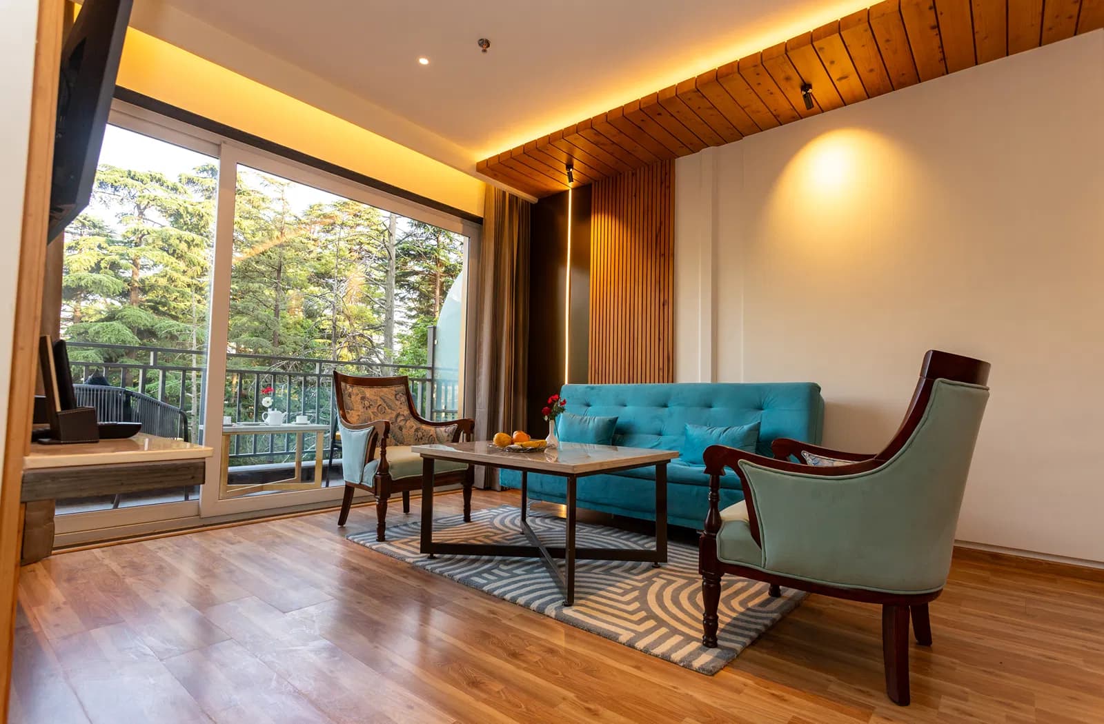 Seating area inside a suite at The Belvedere Himalayan Retreat, McLeod Ganj