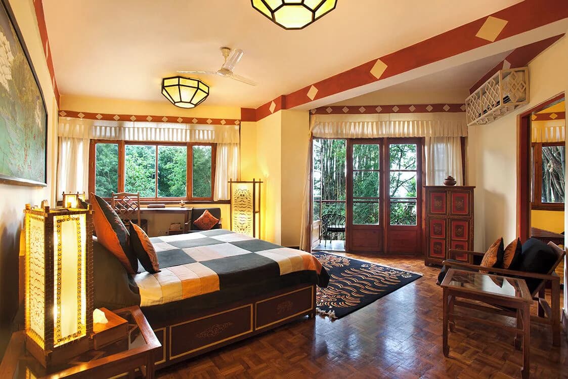 Guest room with hand-painted Tibetan furniture at Norling House, Norbulingka