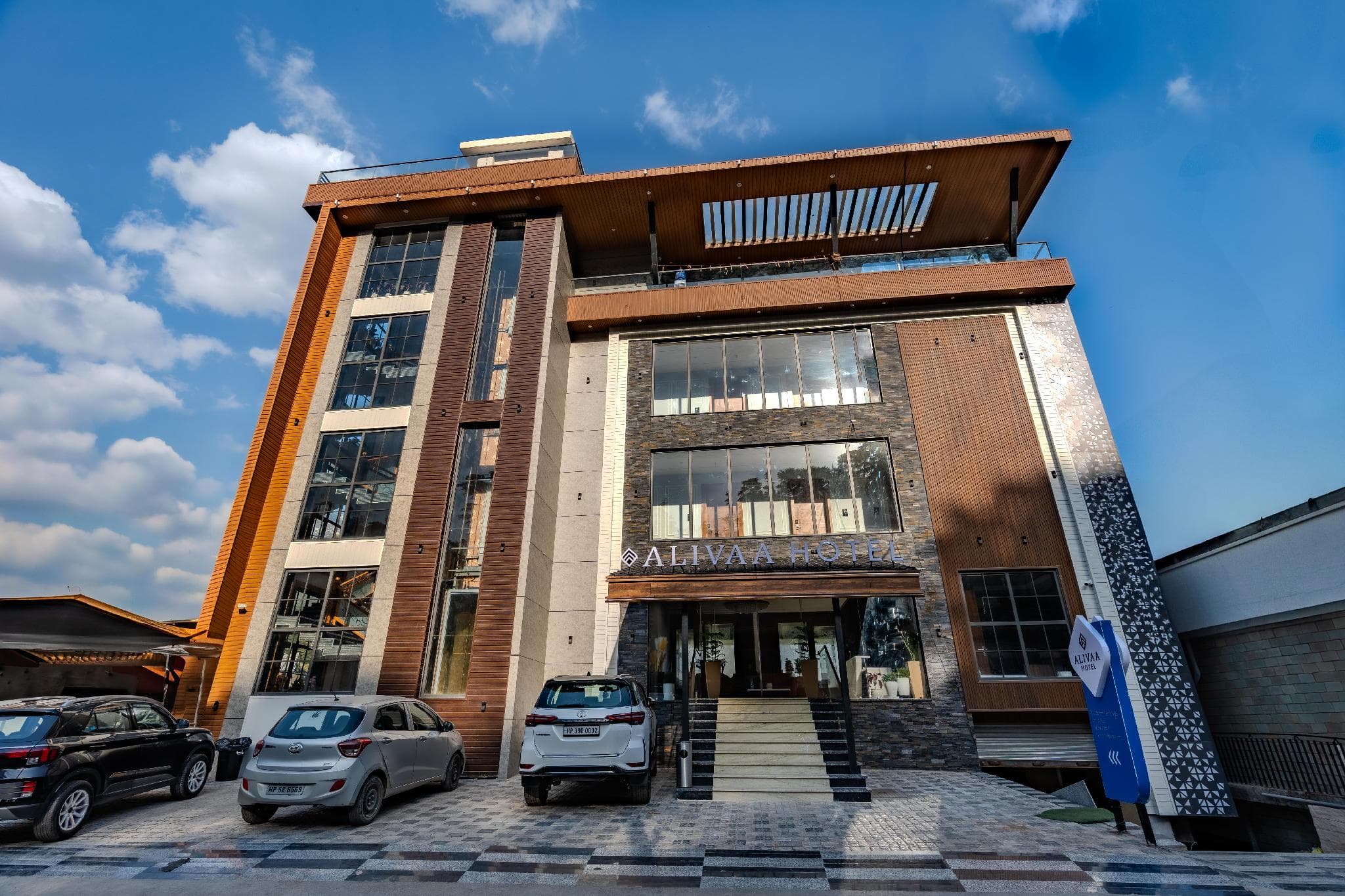 Front of Alivaa Hotel, a four-storey stone and timber building in Forsyth Ganj, McLeod Ganj