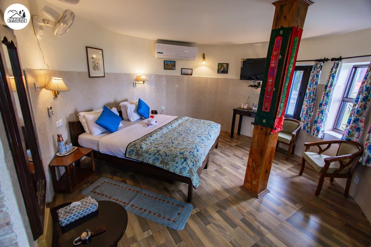 Deluxe Single Room Cottage interior at Udechee Huts, Naddi