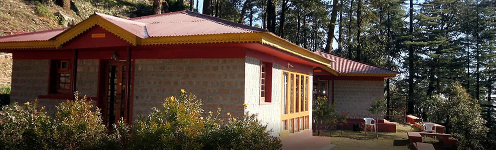 Stone cottage and garden at Glenmoor Cottages, McLeod Ganj